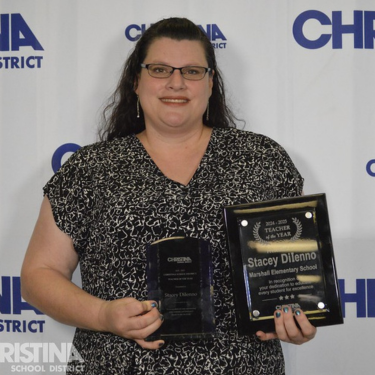 Photo of Stacey DiIenno Christina School District's Teach of the Year and Marshall ES building TOY with award